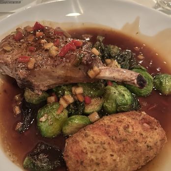 Byrd & Baldwin Bros Steakhouse - Bone-In Pork Chop, Brussels sprouts Prosciutto-Wrapped Mozzarella Garlic Spinach - Steakhouses Near Me - Norfolk, Virginia Byrd & Baldwin Bros Steakhouse - Bone-In Pork Chop, Brussels sprouts Prosciutto-Wrapped Mozzarella Garlic Spinach - Steakhouses Near Me - Norfolk, Virginia