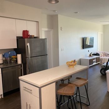 Ryder at Davis Leasing Office - Island (Dining area) living room (communal area) - University Housing Near Me - Davis, California Ryder at Davis Leasing Office - Island (Dining area) living room (communal area) - University Housing Near Me - Davis, California