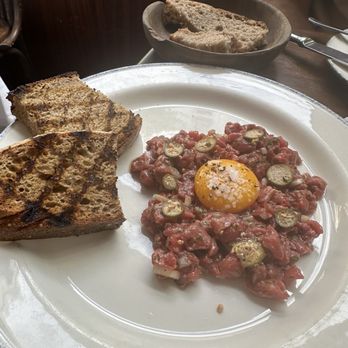 Geralds Bar - Steak tartare. Fresh and with the egg and pickled okra it was the perfect bite. - Modern European Near Me - Donostia-San Sebastián, SS