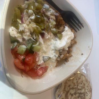NAYA - Chicken shawarma rice bowl with pita - Mediterranean Near Me - New York, New York NAYA - Chicken shawarma rice bowl with pita - Mediterranean Near Me - New York, New York