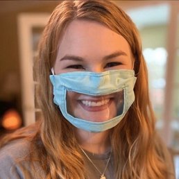 a woman wearing a surgical mask