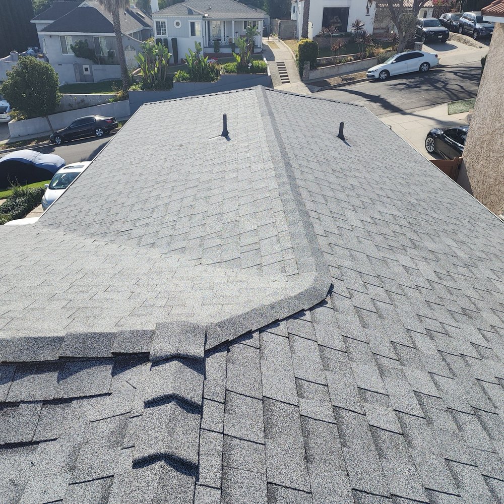 Slide of Pro Roofing Experts