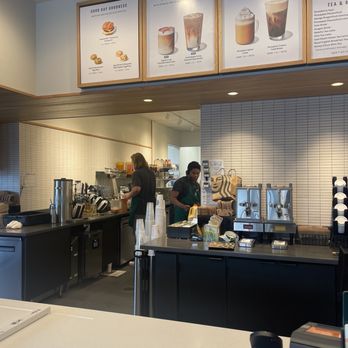 Starbucks - a coffee shop with menus on the wall - Coffee & Tea Near Me - Madison, Tennessee Starbucks - a coffee shop with menus on the wall - Coffee & Tea Near Me - Madison, Tennessee