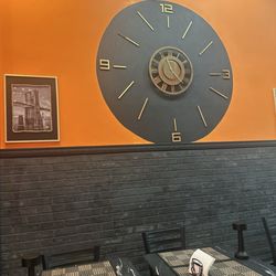 Hunger - The clock display added a nice touch to the room, making the space feel more inviting and welcoming
