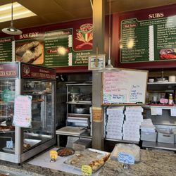 Michaelangelo Pizza & Subs Restaurant - Kitchen and partial menu