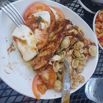 Marilyn's on Morgantown - Where is the basil in this caprese dish...3 tiny slivers. And bagged pasta...even though they have housemade pasta? - New American Near Me - Morgantown, West Virginia Marilyn's on Morgantown - Where is the basil in this caprese dish...3 tiny slivers. And bagged pasta...even though they have housemade pasta? - New American Near Me - Morgantown, West Virginia