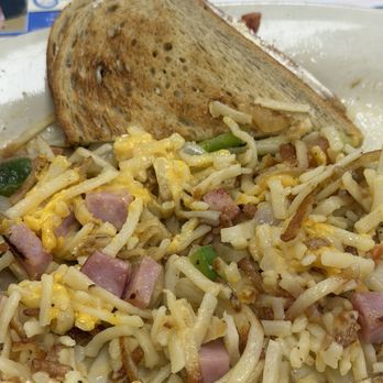 The Cafe - HASH!! with rye toast is a perfect scrambled up mess of a lot of things - Breakfast & Brunch Near Me - Panama City, Florida The Cafe - HASH!! with rye toast is a perfect scrambled up mess of a lot of things - Breakfast & Brunch Near Me - Panama City, Florida