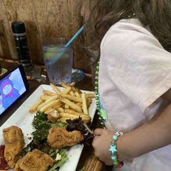 12A Buoy - A picky four year old enjoying chicken tenders (and bacon from the lobster roll!) - Seafood Near Me - Fort Pierce, Florida