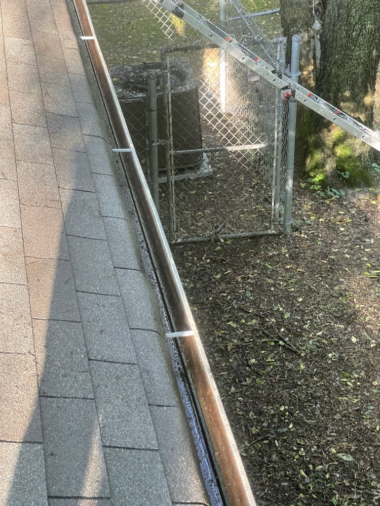 Slide of Marcus Gutters Cleaning