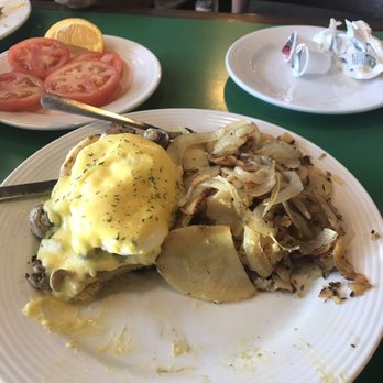 Frog Pond - Frog Benedict with homefries and sauteed onions. Very delicious! - Breakfast & Brunch Near Me - North Redington Beach, Florida Frog Pond - Frog Benedict with homefries and sauteed onions. Very delicious! - Breakfast & Brunch Near Me - North Redington Beach, Florida