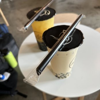 Auntea Ha - Passionfruit soda with extra boba (back), Jasmine milk tea with boba (front) - Bubble Tea Near Me - Portland, Oregon Auntea Ha - Passionfruit soda with extra boba (back), Jasmine milk tea with boba (front) - Bubble Tea Near Me - Portland, Oregon