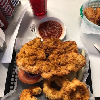 Oasis Diner - Fried Tenderloin sandwich with Onion Rings - Diners Near Me - Plainfield, Indiana