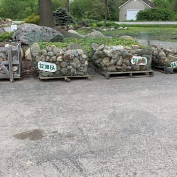 Murray Bros Nurseries & Garden Centre - a row of wooden pallets with rocks on them - Nurseries & Gardening Near Me - Orchard Park, New York Murray Bros Nurseries & Garden Centre - a row of wooden pallets with rocks on them - Nurseries & Gardening Near Me - Orchard Park, New York