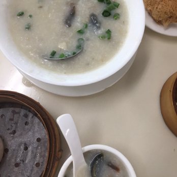 Ginger & Garlic - Pork and thousand year old egg congee ($6.95). I love congee - Dim Sum Near Me - Honolulu, Hawaii