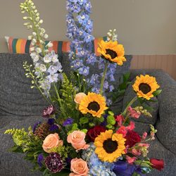 Heavy Petal Floral - Artistic tribute floral arrangement.