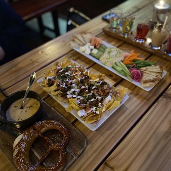The 649 - Pretzel with cheese fondue, pork nachos, hummus plate - Beer Bar Near Me - Beaverton, Oregon The 649 - Pretzel with cheese fondue, pork nachos, hummus plate - Beer Bar Near Me - Beaverton, Oregon