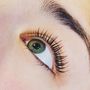Lashed by Lucia