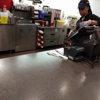 Wendy's - On her phone with gloves on, as if its okay. - Burgers Near Me - Brooklyn, New York