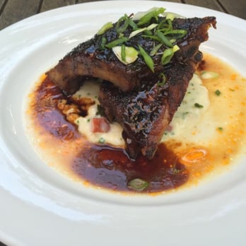 Mildred's Temple Kitchen - Coffee Smoked Baby Back Ribs (w/ aged cheddar grits, garlic braised greens & ham hock broth) - Breakfast & Brunch Near Me - Toronto, Ontario Mildred's Temple Kitchen - Coffee Smoked Baby Back Ribs (w/ aged cheddar grits, garlic braised greens & ham hock broth) - Breakfast & Brunch Near Me - Toronto, Ontario