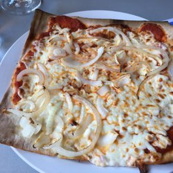 Faste Fou Restaurant Bar - Sublime pizza à croute extra mince! Celle-ci est la pizza à l'ognon.