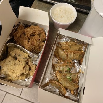 Noori Chicken/ Pocha - Plain wings (soy garlic on the side), magic sprinkle wings, dumplings and rice. - Korean Near Me - Clawson, Michigan