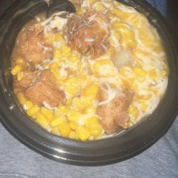 KFC - Asked for a famous bowl with extra nuggets(witch is an up charge)and extra cheese and I got 4 nuggets witch is less thenthe base famous bowl