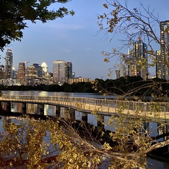 Cidercade Austin - View of Austin skyline, boardwalk and Lady Bird Lake from Cidercade Austin's outdoor seating area. - Pizza Near Me - Austin, Texas