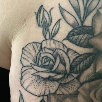 Red Room Tattoo - First rose on the front and they look nothing alike - Tattoo Near Me - Chico, California