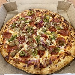 The Texan - 12" Mega Meat Lovers with red onion and jalapeños