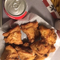 KFC - Comparing the size of chicken pieces to the top of a coke can.