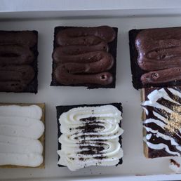 Classical brownies on top Blondie bottom left  Oreo bottom center  Smores bottom right