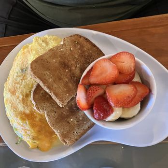 Two Chicks Cafe - Build your Chicks Omelet with multigrain bread and fruit - Breakfast & Brunch Near Me - New Orleans, Louisiana Two Chicks Cafe - Build your Chicks Omelet with multigrain bread and fruit - Breakfast & Brunch Near Me - New Orleans, Louisiana