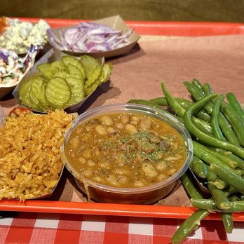 Terry Black's Barbecue - Sample of all the sides they offer. The cream corn is to die for! - Barbeque Near Me - Austin, Texas Terry Black's Barbecue - Sample of all the sides they offer. The cream corn is to die for! - Barbeque Near Me - Austin, Texas