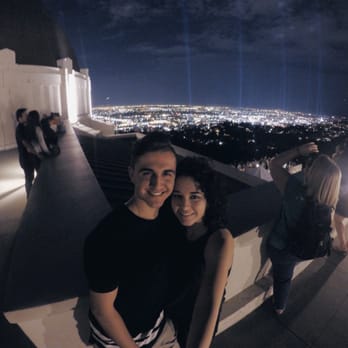 Griffith Observatory - The lights in the back are spot lights which were lit up to celebrate the LA Marathon's 30th anniversary! - Observatories Near Me - Los Angeles, California Griffith Observatory - The lights in the back are spot lights which were lit up to celebrate the LA Marathon's 30th anniversary! - Observatories Near Me - Los Angeles, California
