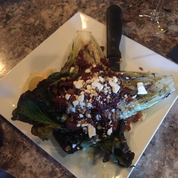 Freudy's Bar and Grille - Grilled romaine salad with dried cranberries, crumbled cheese, and other things. They dressing is amazing! - New American Near Me - Canton, Ohio Freudy's Bar and Grille - Grilled romaine salad with dried cranberries, crumbled cheese, and other things. They dressing is amazing! - New American Near Me - Canton, Ohio