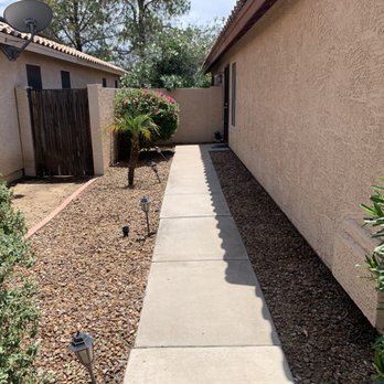 The family landscaping - a walkway between two houses - Lawn Services Near Me The family landscaping - a walkway between two houses - Lawn Services Near Me