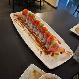 a plate of sushi on a table