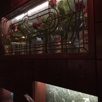 Pharmarium - cool decoration on the walls paired with dim lighting gives a creative and speak-easy type vibe. - Cocktail Bars Near Me - Stockholm, Alberta Pharmarium - cool decoration on the walls paired with dim lighting gives a creative and speak-easy type vibe. - Cocktail Bars Near Me - Stockholm, Alberta
