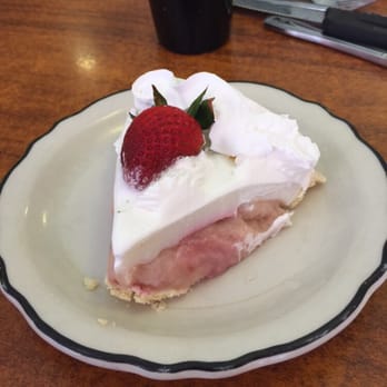 Anna Miller's - Haupia Strawberry aka Palmolive Surprise. The only fresh strawberry is the half-berry sitting as garnish. Not good at all. - Bakeries Near Me - Aiea, Hawaii