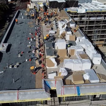 Elite Roofing & Waterproofing - New Construction In Progress GAF Tapered Poly ISO Installation Complete Adhered System - Roofing Near Me - Oakland, California Elite Roofing & Waterproofing - New Construction In Progress GAF Tapered Poly ISO Installation Complete Adhered System - Roofing Near Me - Oakland, California