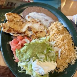 El Maiz Mexican Restaurant - Pollo Loco comes with a guacamole salad, rice, beans, chicken and your tortillas of choice.