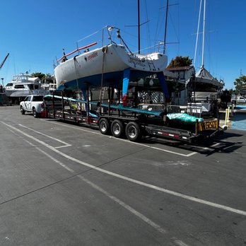 sunset yacht transport - Sail boat being loaded at the marina - Boat Repair Near Me - Palm Desert, California sunset yacht transport - Sail boat being loaded at the marina - Boat Repair Near Me - Palm Desert, California