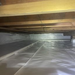 Crawlspace with moisture barrier installed.
