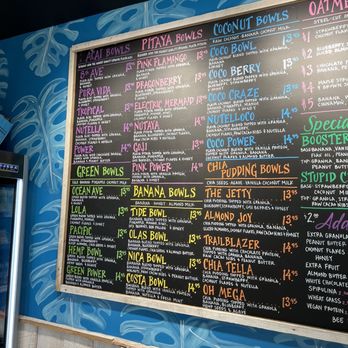 Playa Bowls - Times Square - a menu on the wall - Acai Bowls Near Me - New York, New York Playa Bowls - Times Square - a menu on the wall - Acai Bowls Near Me - New York, New York