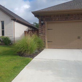Landscaping...by Rigo - the front of a house and driveway - Lawn Services Near Me - Manor, Texas Landscaping...by Rigo - the front of a house and driveway - Lawn Services Near Me - Manor, Texas