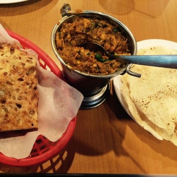 Mumbai Chowk - From L to R: Onion Kulcha naan, Balti chicken (shredded chicken, spinach, onions and bell peppers) and papad (lentil wafers) - Indian Near Me - Newark, California Mumbai Chowk - From L to R: Onion Kulcha naan, Balti chicken (shredded chicken, spinach, onions and bell peppers) and papad (lentil wafers) - Indian Near Me - Newark, California