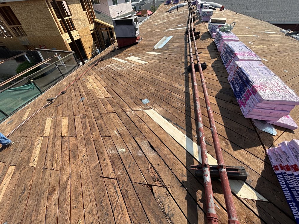 Slide of EZ Roof Repairs