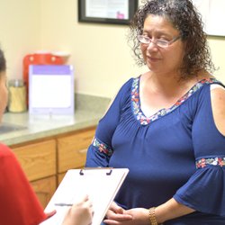 Wellness Health Group - Specialist Zulema assisting a patient