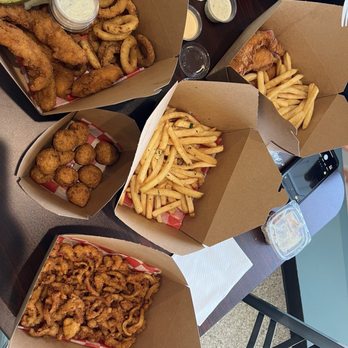 Fishmongers Seafood Market - Truffle fries fried catfish fried cod hush puppies clam strips - Fish & Chips Near Me - Grand Rapids, Michigan Fishmongers Seafood Market - Truffle fries fried catfish fried cod hush puppies clam strips - Fish & Chips Near Me - Grand Rapids, Michigan