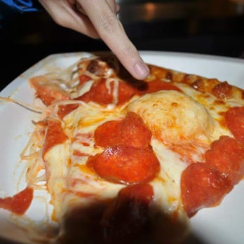 T-Mobile Park - Super greasy pizza from the stands. Check out the weird cheese bubble! - Stadiums & Arenas Near Me - Seattle, Washington